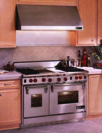 Wolf 48" Range, Stainless finish, Griddle, and Charbroiler, shown with Wolf hood